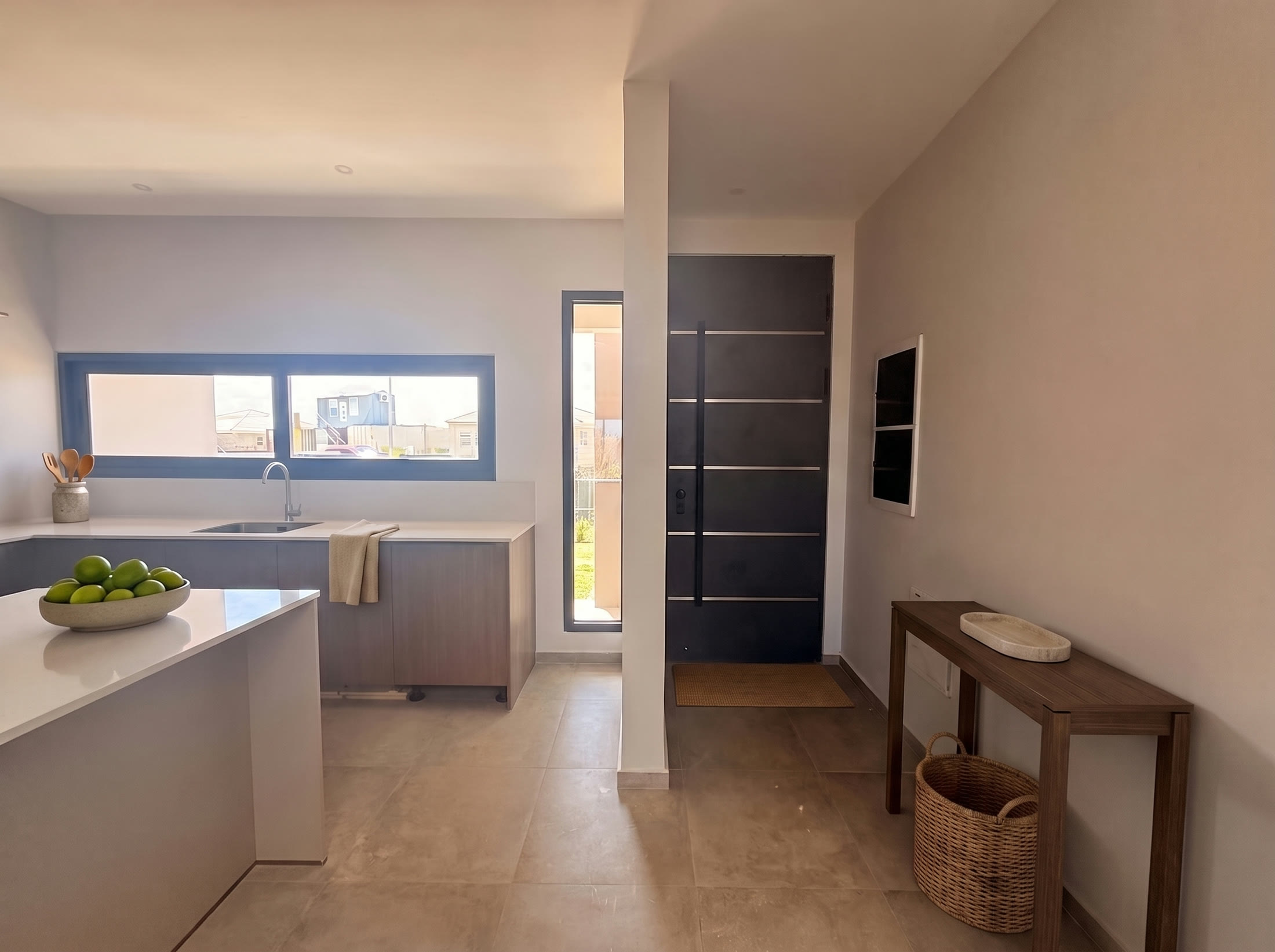 Kitchen worktop with sink under a wide window