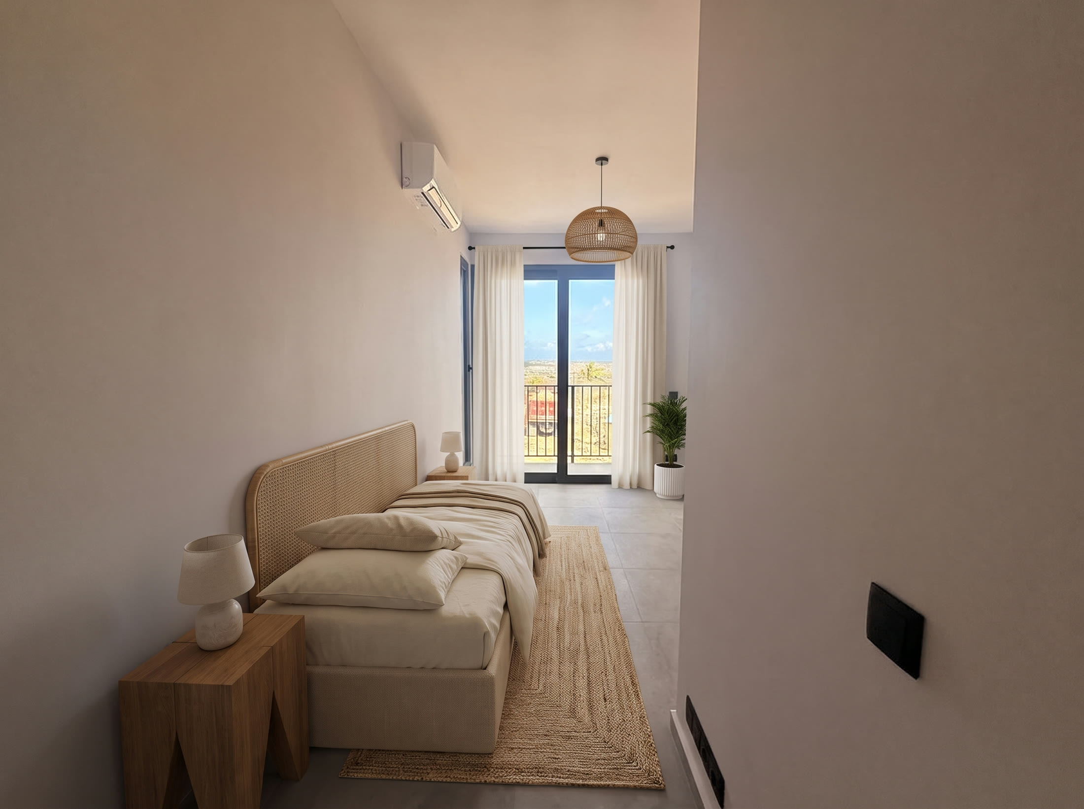 Narrow bedroom with a single bed and sliding door onto the balcony