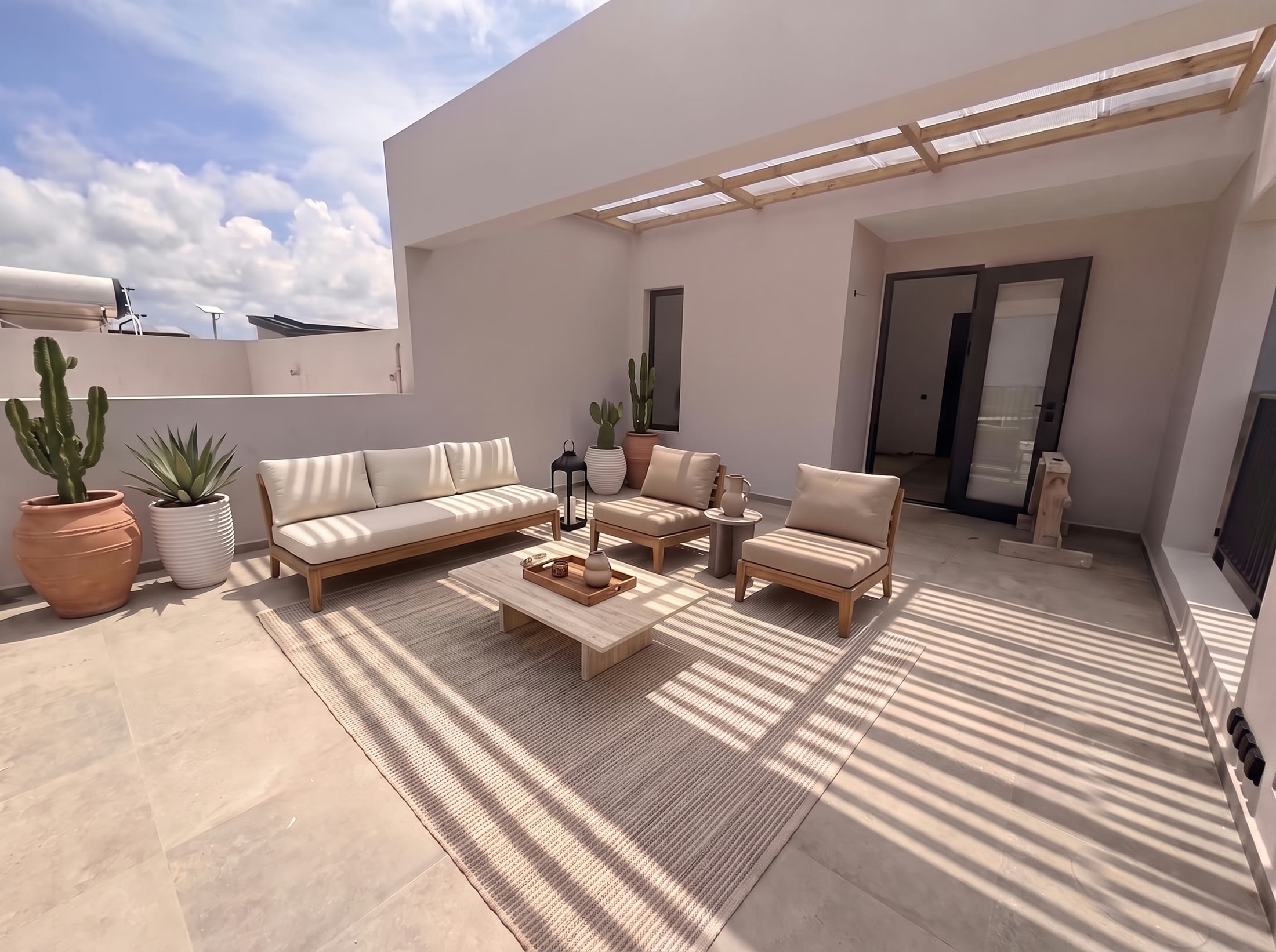 Roof terrace with teak lounge seating under a covered pergola
